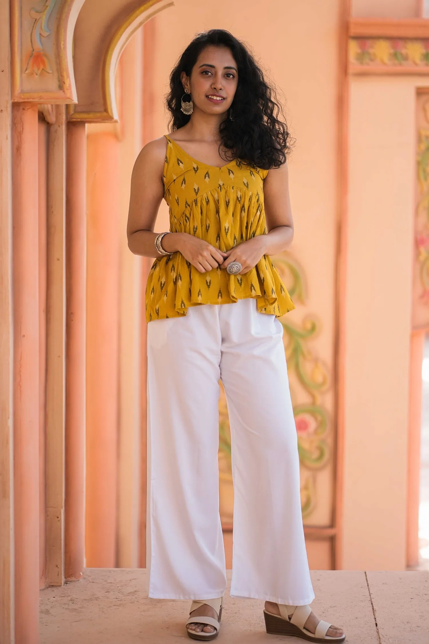 Mustard Ikat Print Peplum Sleeveless Top