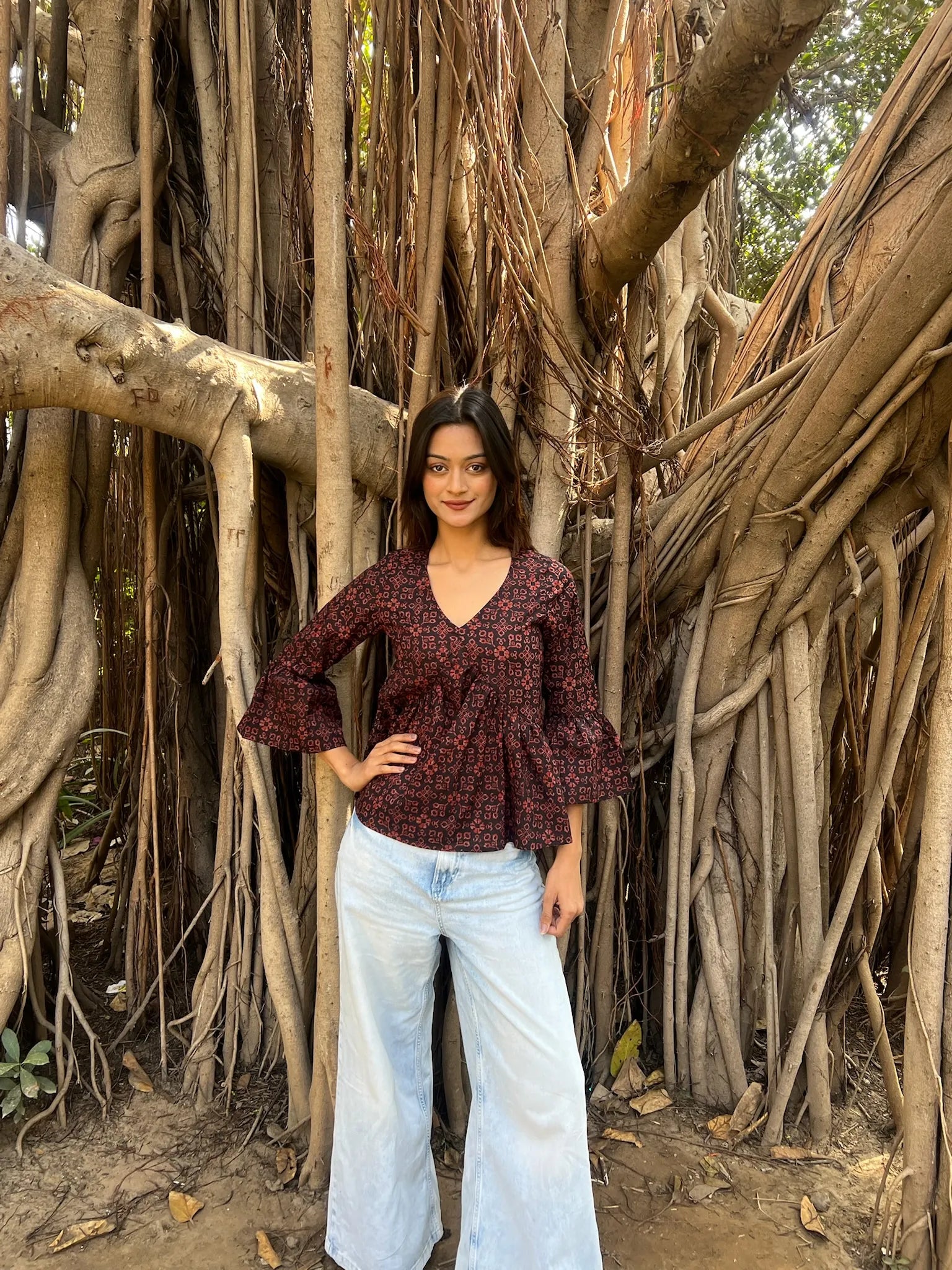Maroon Dabu Peplum Top