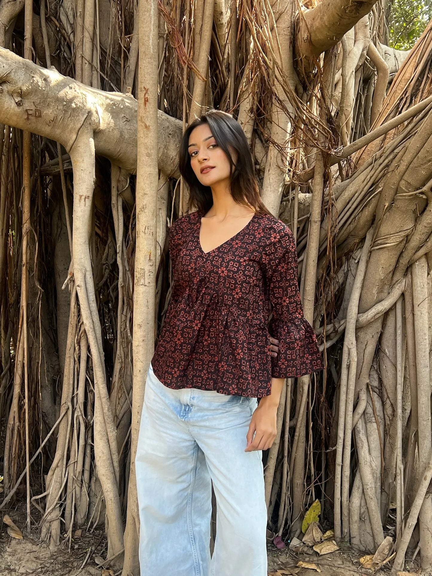 Maroon Dabu Peplum Top